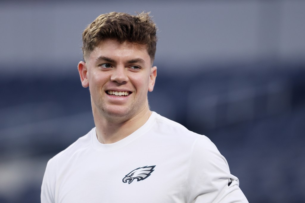 Cooper Dejean #33 of the Philadelphia Eagles warms up prior to a game against the Los Angeles Chargers at SoFi Stadium on December 8, 2025 in Inglewood, California. 