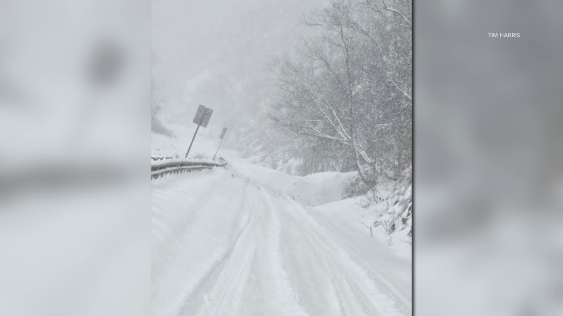 Large amount of snow falls onto roadway in Duryea