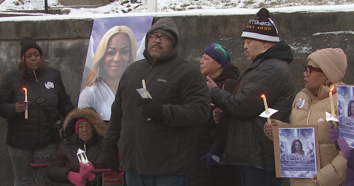 Family, friends of woman found dead in North Side home call for answers at candle vigil