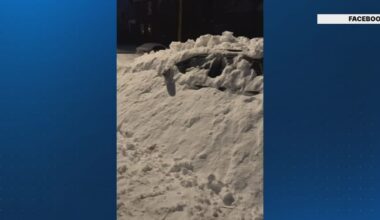 Fight over parking spot ends with car buried in snow, police called