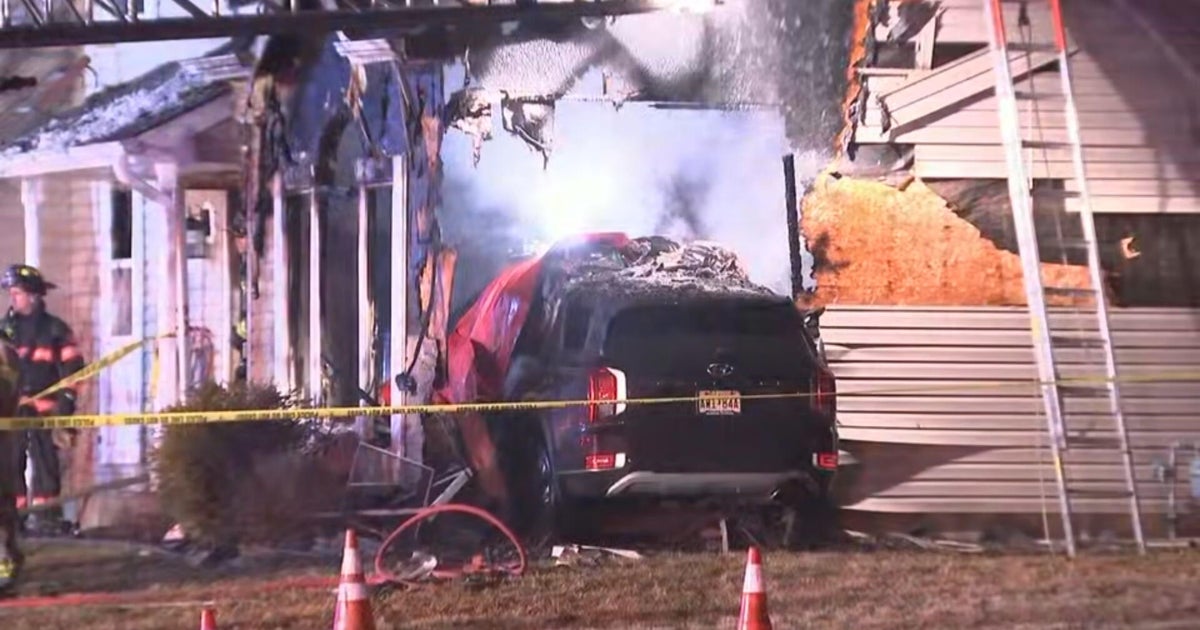 2 dead after car crashes into house in Harrison Township, New Jersey sparking fire, police say