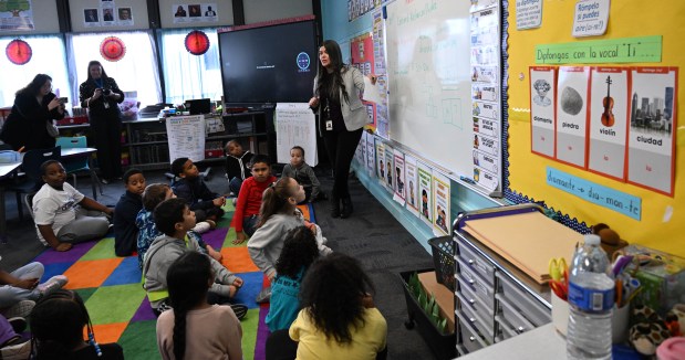 Miss Munoz, a teacher at the Sonia Sotomayor Dual Language Academy, works with students in her classroom during a tour Thursday, Jan. 15, 2026, at the Allentown school sponsored by the American Federation of Teachers, the American Federation of Teachers Pennsylvania, the Allentown Federation of Paraprofessionals, the Labor Council for Latin American Advancement and the Allentown School District. State Rep. Peter Schweyer, D-Lehigh, was among those attending the event intended to highlight the contributions to the district by paraprofessionals and the local Latino community. (Amy Shortell/The Morning Call)