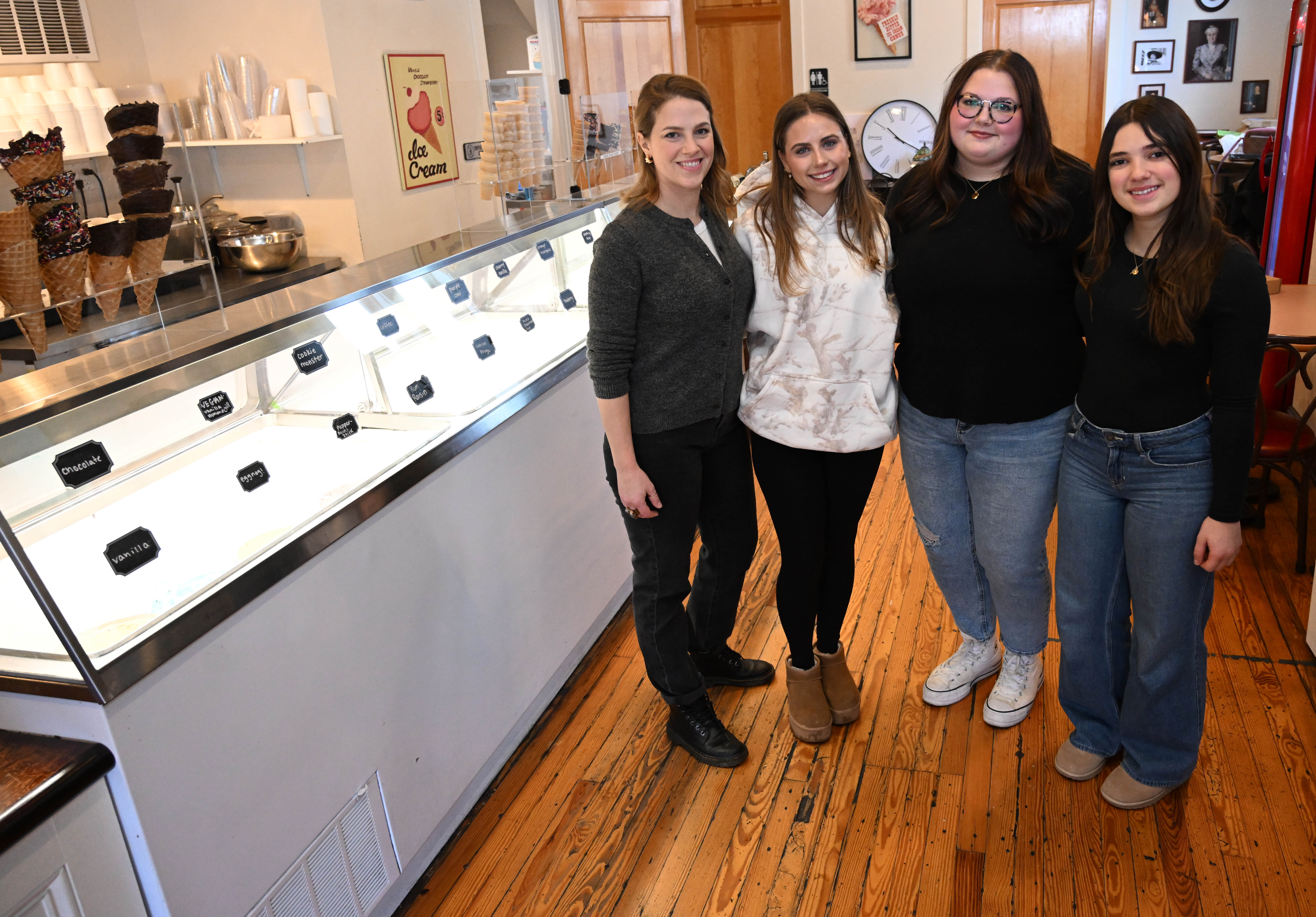 New Emily’s Ice Cream owner Mylea Biggiani, left, and staff...
