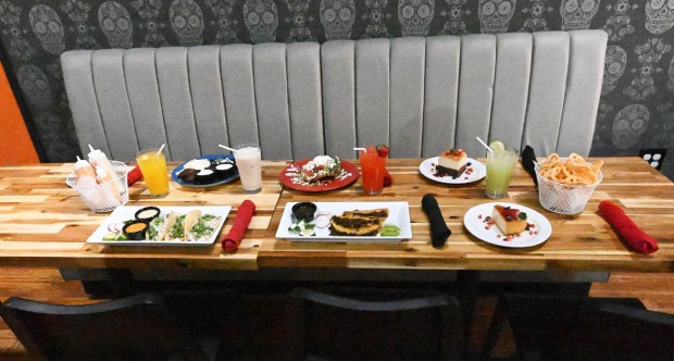 A table with a variety of menu items is seen Thursday, Jan. 8, 2026, at La Cocina del Abuelo's new location on West Broad Street in Bethlehem. (Amy Shortell/The Morning Call)