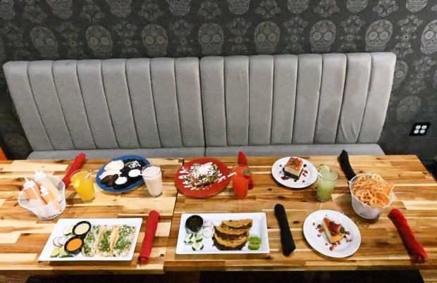 A table with a variety of menu items is seen Thursday, Jan. 8, 2026, at La Cocina del Abuelo's new location on West Broad Street in Bethlehem. (Amy Shortell/The Morning Call)