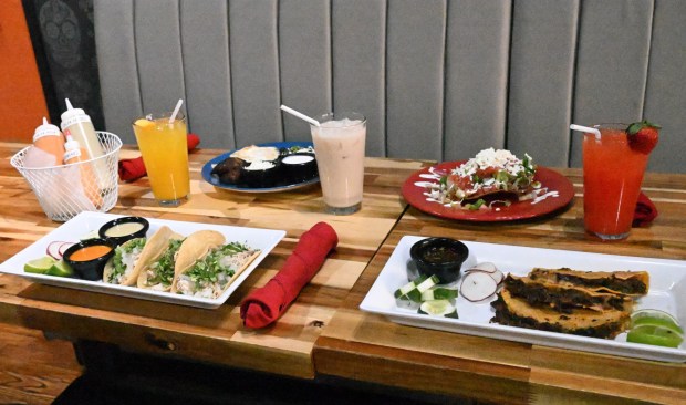 A table with a variety of menu items is seen Thursday, Jan. 8, 2026, at La Cocina del Abuelo's new location on West Broad Street in Bethlehem. (Amy Shortell/The Morning Call)