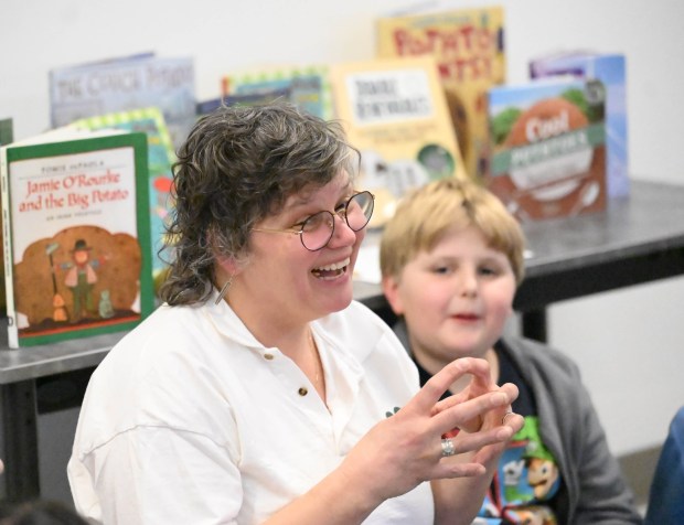 Ellen Siftar leads a find the potato activity Tuesday, Jan. 13, 2026, during 4-H at the Library at Parkland Community Library in South Whitehall Township. The program allows children to explore a range of topics through the 4-H curriculum, with each session offering a new theme, such as science experiments and robotics, art projects, healthy living, and agriculture. (Amy Shortell/The Morning Call)
