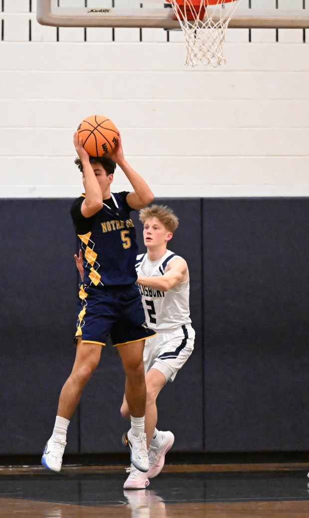 Notre-Dame Green Pond's Quinn Bohn drives down the court Tuesday, Jan. 13, 2026, during a game against Salisbury at Salisbury High School. (Amy Shortell/The Morning Call)