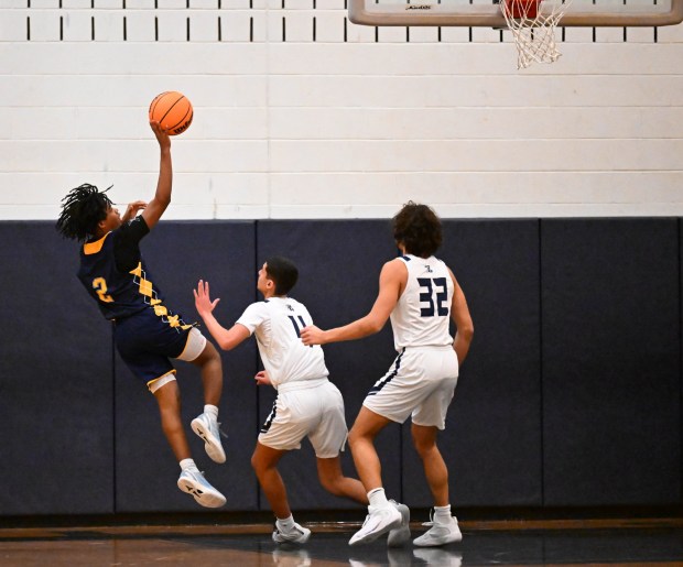 Notre-Dame Green Pond's Justin Manning shoots the ball Tuesday, Jan. 13, 2026, during a game against Salisbury at Salisbury High School. (Amy Shortell/The Morning Call)