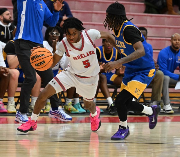 Parkland's Nassir Adams drives down the court  Tuesday, Jan. 20, 2026, during a game against Allen High School at Parkland High School. (Amy Shortell/The Morning Call)