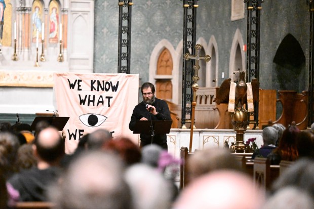 Rev. John Stratton, 8th Rector of Nativity & 14th Dean of the Cathedral, speaks during a vigil for Renee Nicole Good, the woman shot and killed by a federal immigration agent in Minneapolis, on Friday, Jan. 9, 2026, at the Cathedral Church of the Nativity in Bethlehem. (Amy Shortell/The Morning Call)