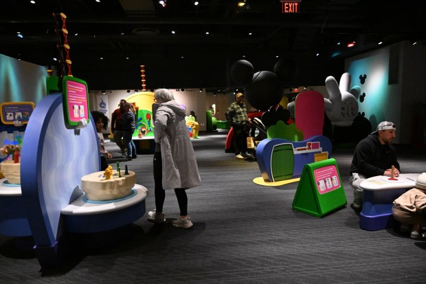 Families examine the Mickey Mouse Clubhouse exhibit Friday, Jan. 2, 2026, at the Da Vinci Science Center in Allentown. (Amy Shortell/The Morning Call)