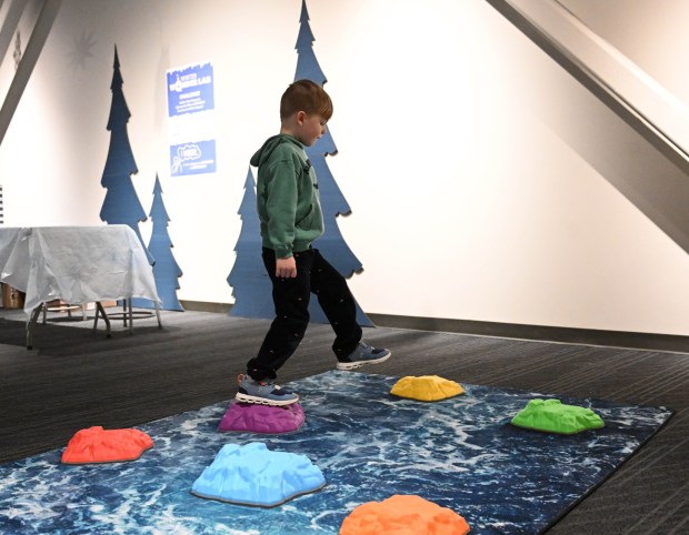 Henry Beck,5, plays with stepping stones Friday, Jan. 2, 2026, in the Winter Wonder Lab exhibit at the Da Vinci Science Center in Allentown. (Amy Shortell/The Morning Call)