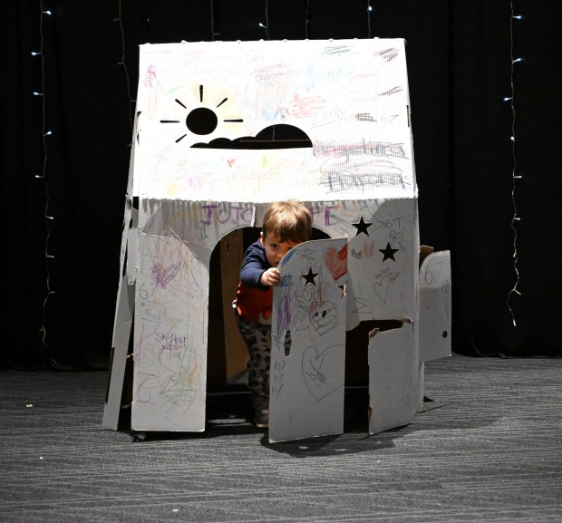 William Oplinger, 2,of Phoenixville, plays in a colorful house Friday, Jan. 2, 2026, in the Winter Wonder Lab exhibit at the Da Vinci Science Center in Allentown. (Amy Shortell/The Morning Call)