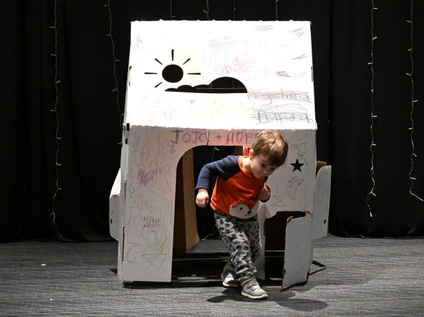 William Oplinger, 2,of Phoenixville, plays in a colorful house Friday, Jan. 2, 2026, in the Winter Wonder Lab exhibit at the Da Vinci Science Center in Allentown. (Amy Shortell/The Morning Call)