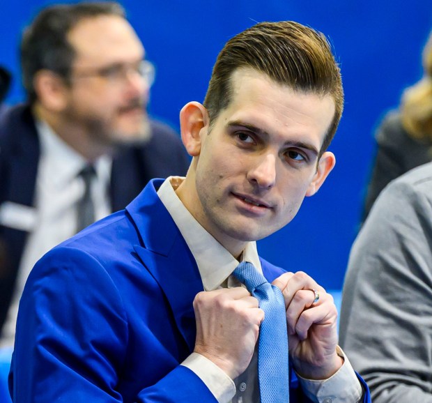 Josh Siegel adjusts his tie before speaking Monday, Jan. 5, 2026, during his swearing-in ceremony for Lehigh County executive at The Boys and Girls Club of Allentown Cumberland Gardens Clubhouse. (April Gamiz / The Morning Call)