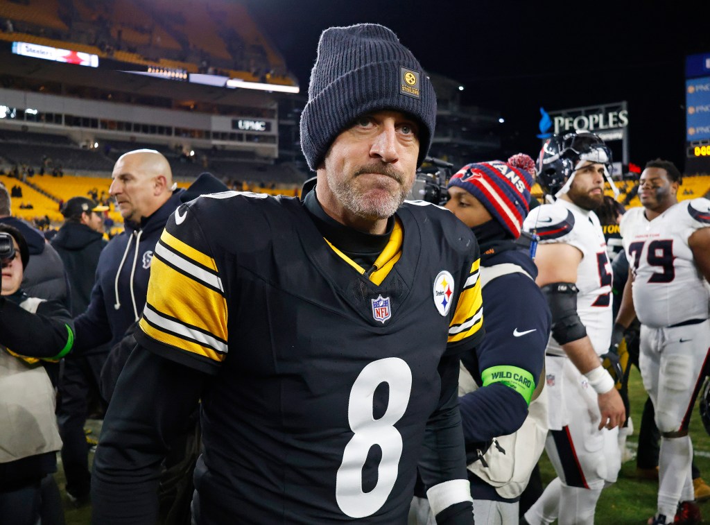 Pittsburgh Steelers quarterback Aaron Rodgers (8) walks off the field.