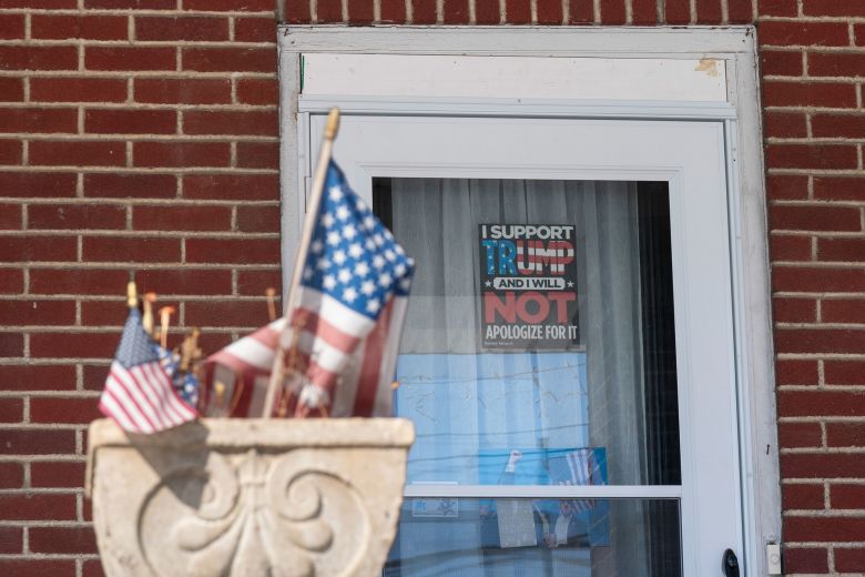 A home displays a sign in support of President Donald Trump in Emmaus, Pennsylvania.