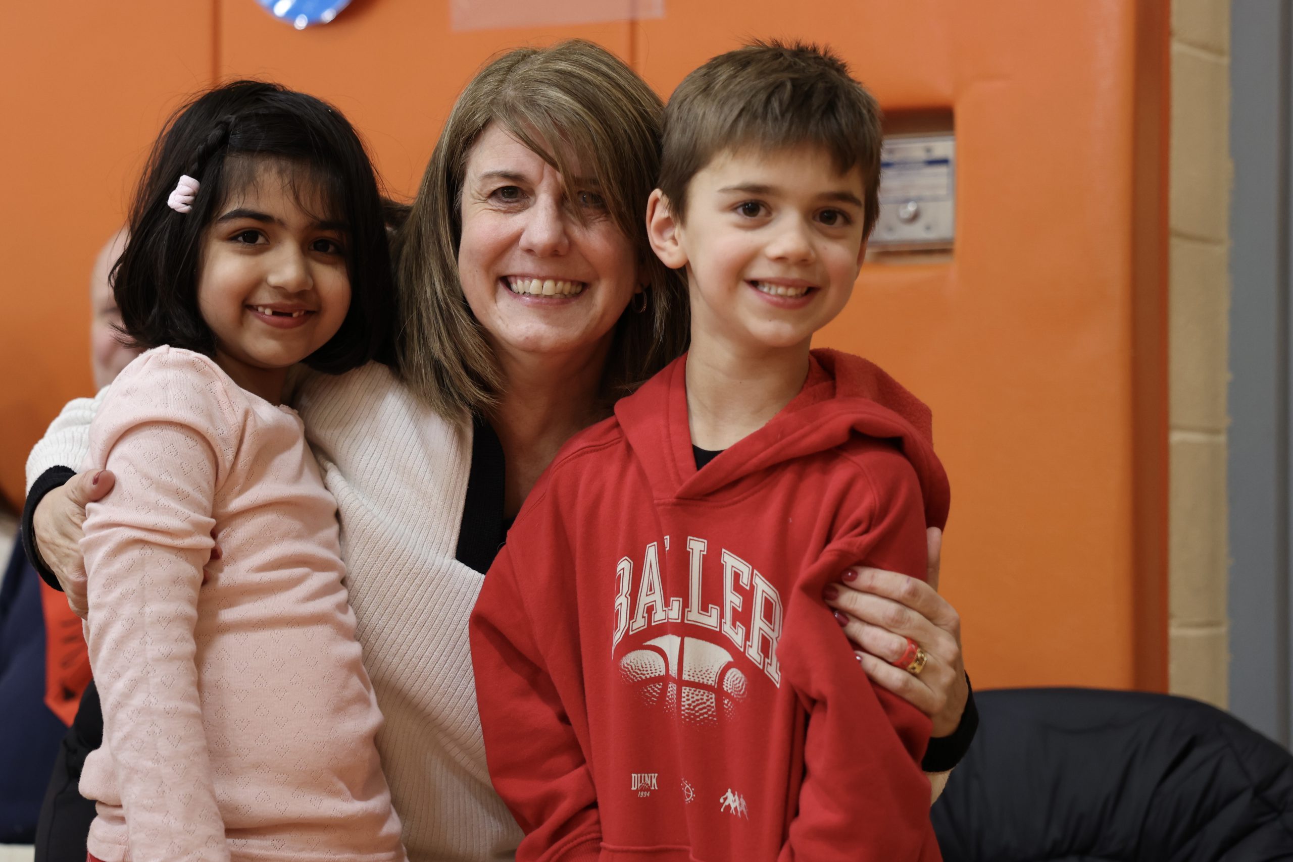 Image of Principal Reagan with students