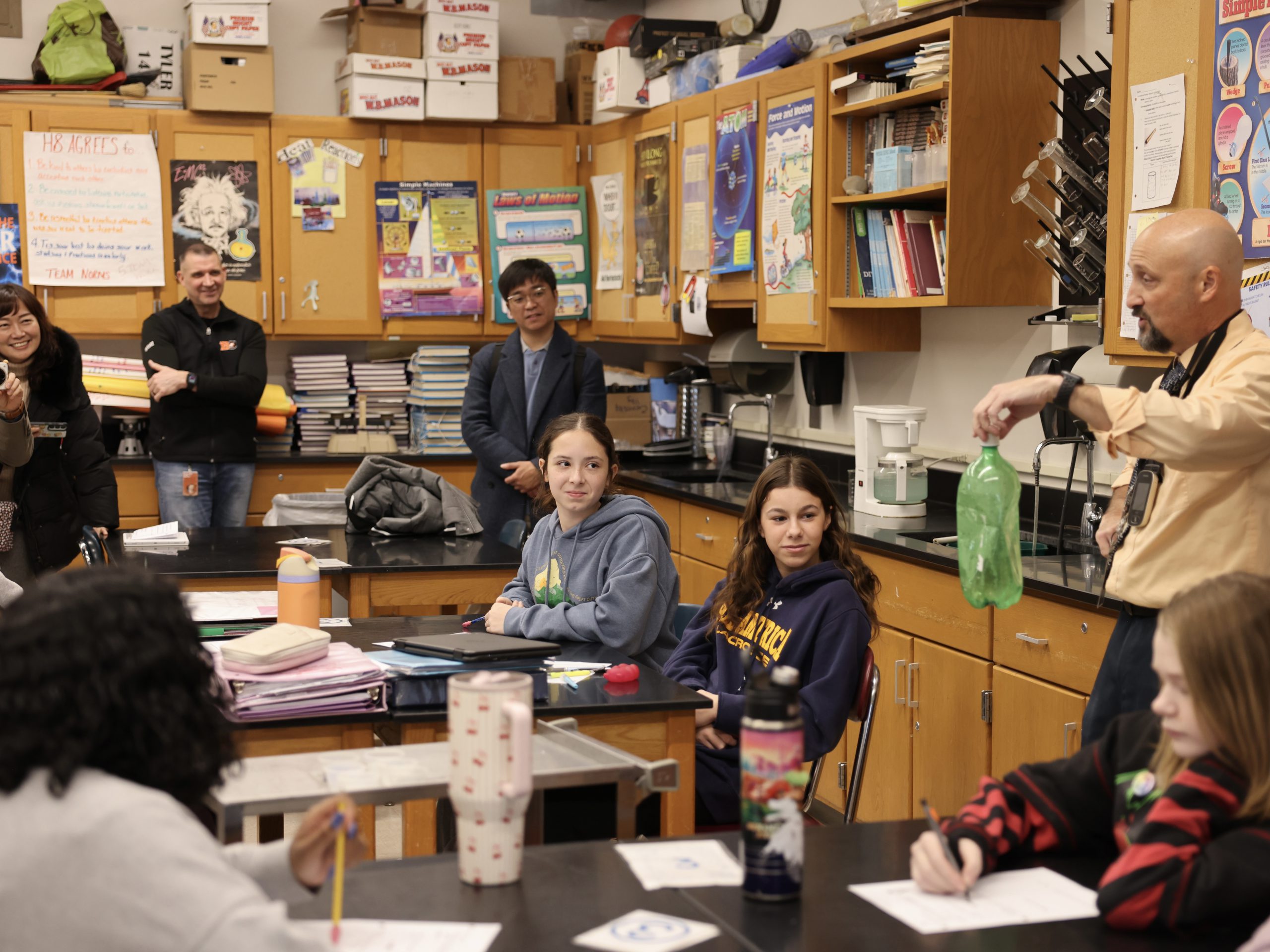 science class experiment with two liter bottle
