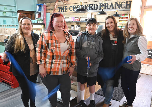 <p>The Crooked Branch Gift Shop held a ribbon-cutting ceremony for the Crooked Branch Cafe, a take-out coffee shop. From left: Brandi Bartush, Greater Pittston Chamber of Commerce; Dorothea Cienki, Crooked Branch; E.J. Roback; Angie Roback, Crooked Branch owner; Sara Hogan, Chamber.</p>
<p>Tony Callaio | For Sunday Dispatch</p>