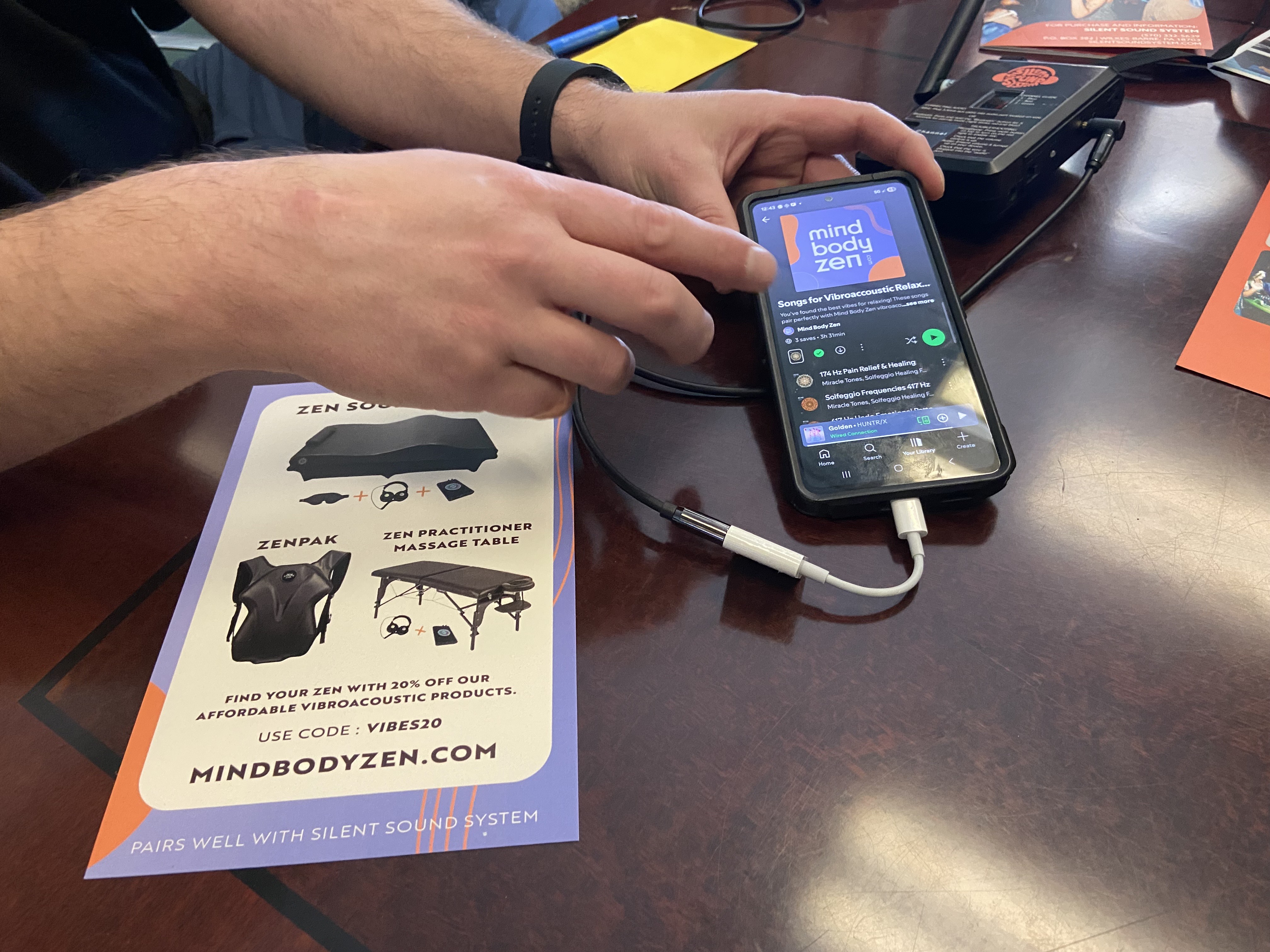 Silent Sound System Managing Director Brad Wells shows a playlist...