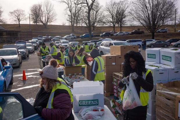 Volunteers with the Greater Pittsburgh Community Food Bank distribute food to residents in Clairton, Pa., on Thursday, Jan. 22, 2026. (Quinn Glabicki/Pittsburgh's Public Source via AP)
