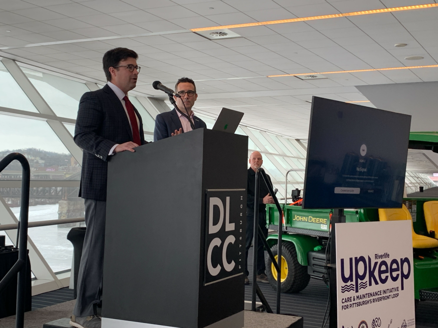 Cory O'Connor stood with president of Riverlife Matthew Galluzo to announce the official launch of UpKeep.