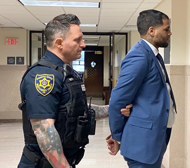 Jovan McCreary is escorted by a deputy sheriff from a Montgomery County courtroom during a break at his trial. (Photo by Carl Hessler Jr. - MediaNews Group)