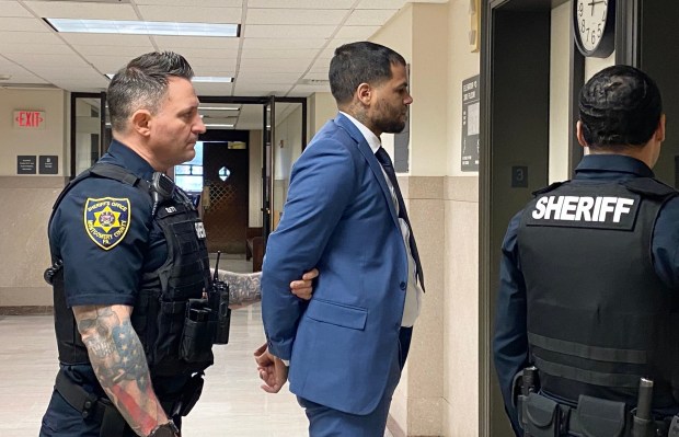 Jovan McCreary is escorted by sheriff's deputies from a Montgomery County courtroom during a break at his trial. (Photo by Carl Hessler Jr. - MediaNews Group)
