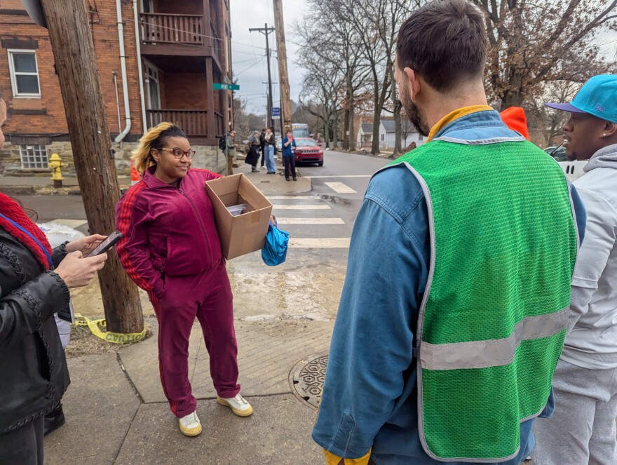 Ashley Comans of Wilkinsburg speaks other observers keeping an eye out for immigration-control officers outside Kelly Primary on Feb. 18, 2026