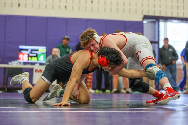 Delaware Valley's JJ Segal, left, wrestles Honesdale's Duke Martin during the Lackawanna League Championships on Saturday at Wallenpaupack. (JASON ARDAN / STAFF PHOTOGRAPHER)