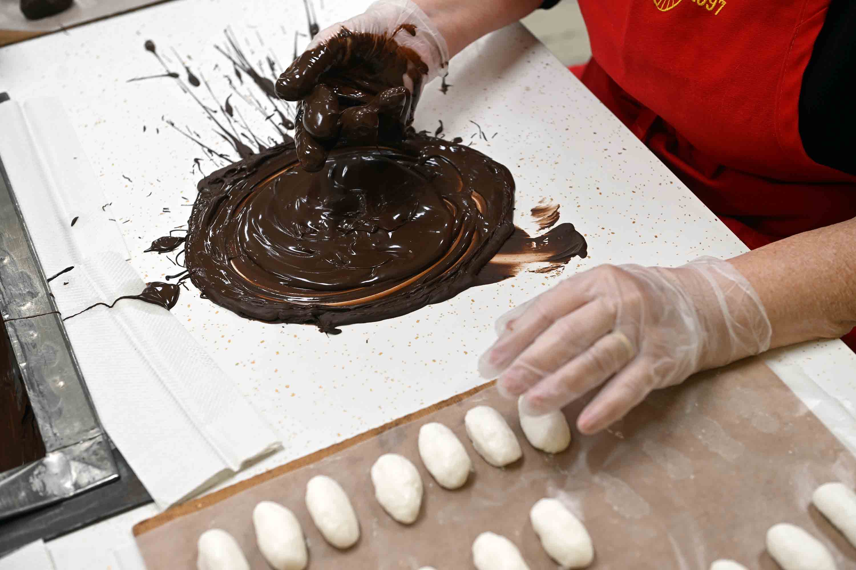Coconut eggs are covered in chocolate at Schwarzwald United Church...