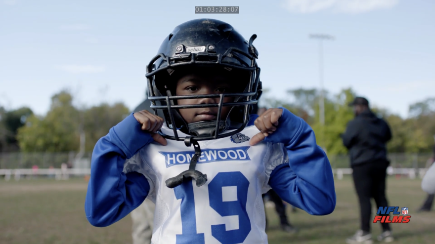 boy in a football uniform