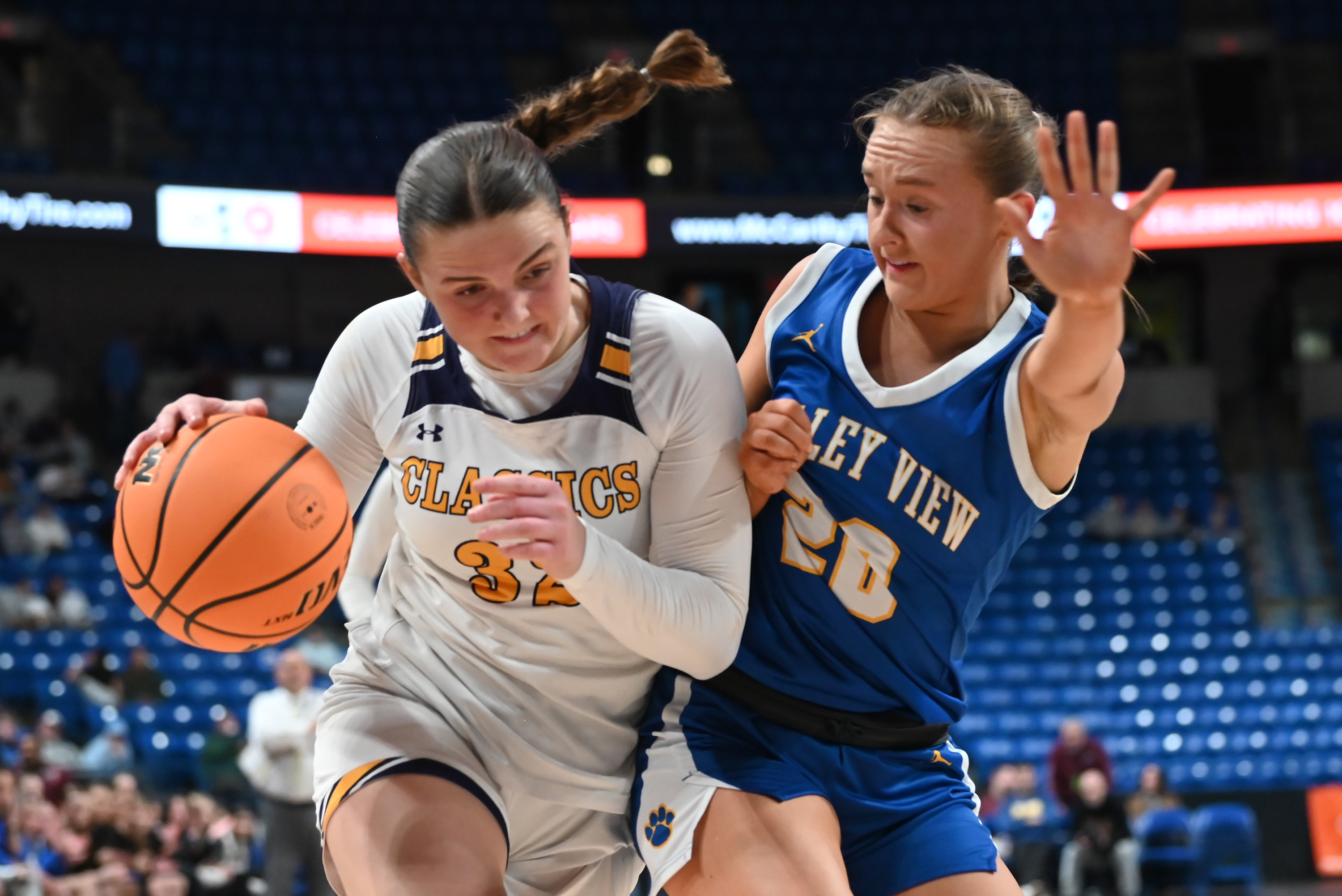Valley View’s Ava Gazoo collides with Scranton Prep’s Chloe Mamera...