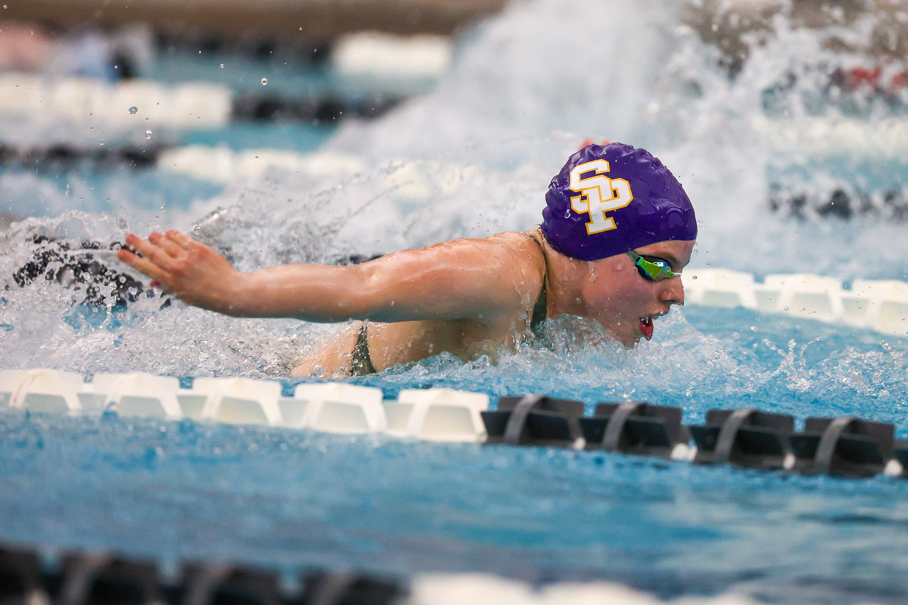 Scranton Prep’s Rebecca Oakes swims the 100 butterfly during the...