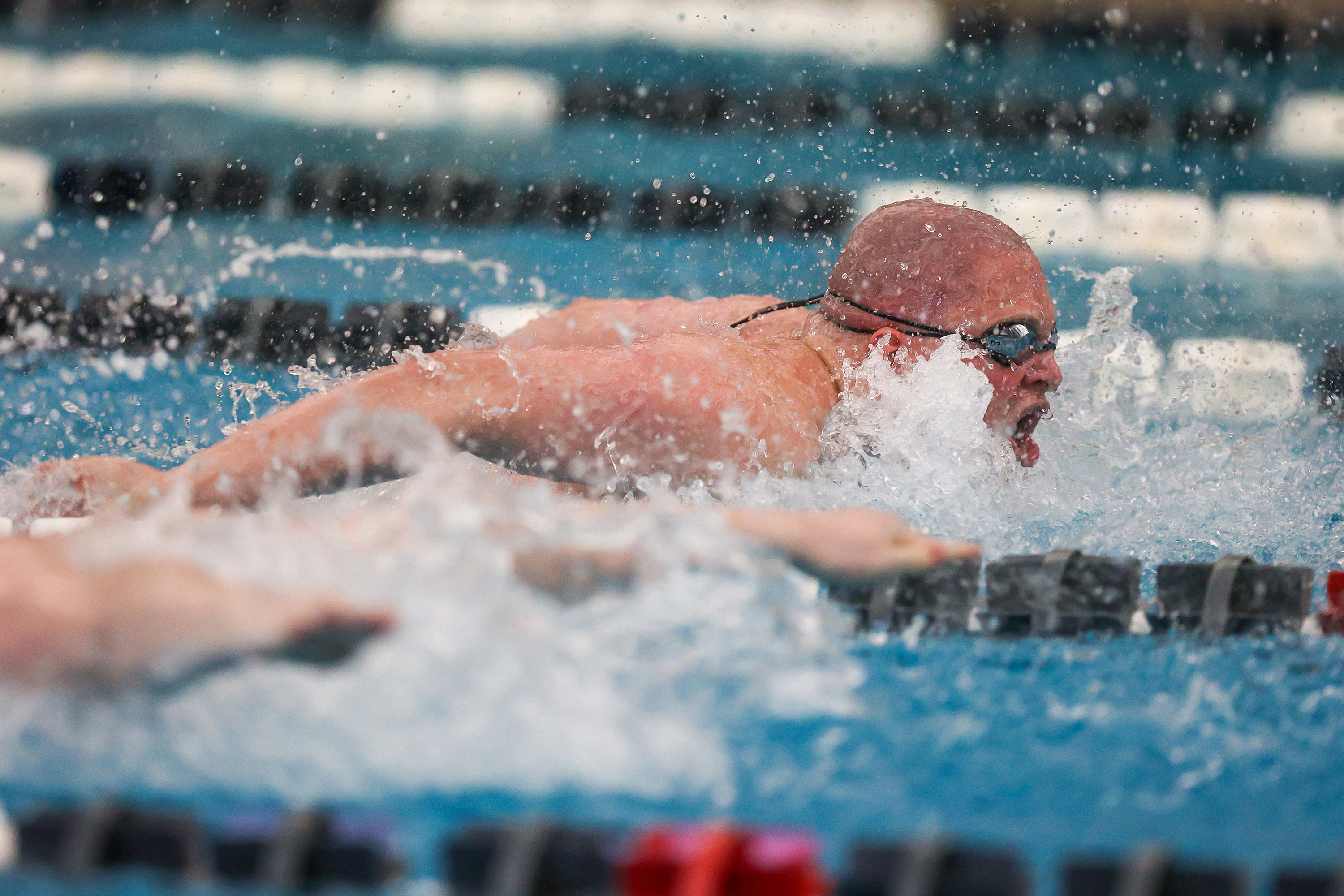 Tunkhannock Area’s Aidan Mislevy swims the butterfly leg of the...