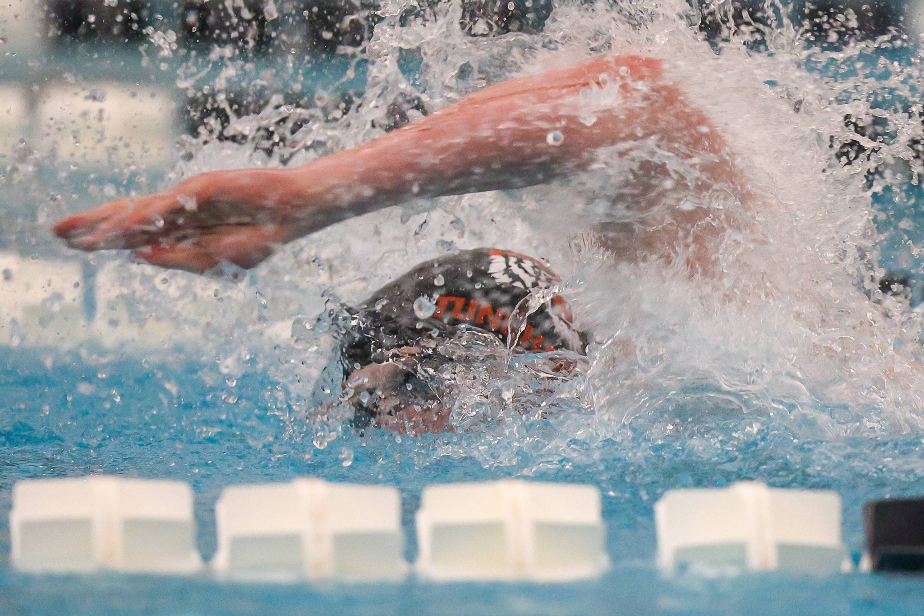 Tunkhannock Area’s Aidan Mislevy swims the final leg of the...
