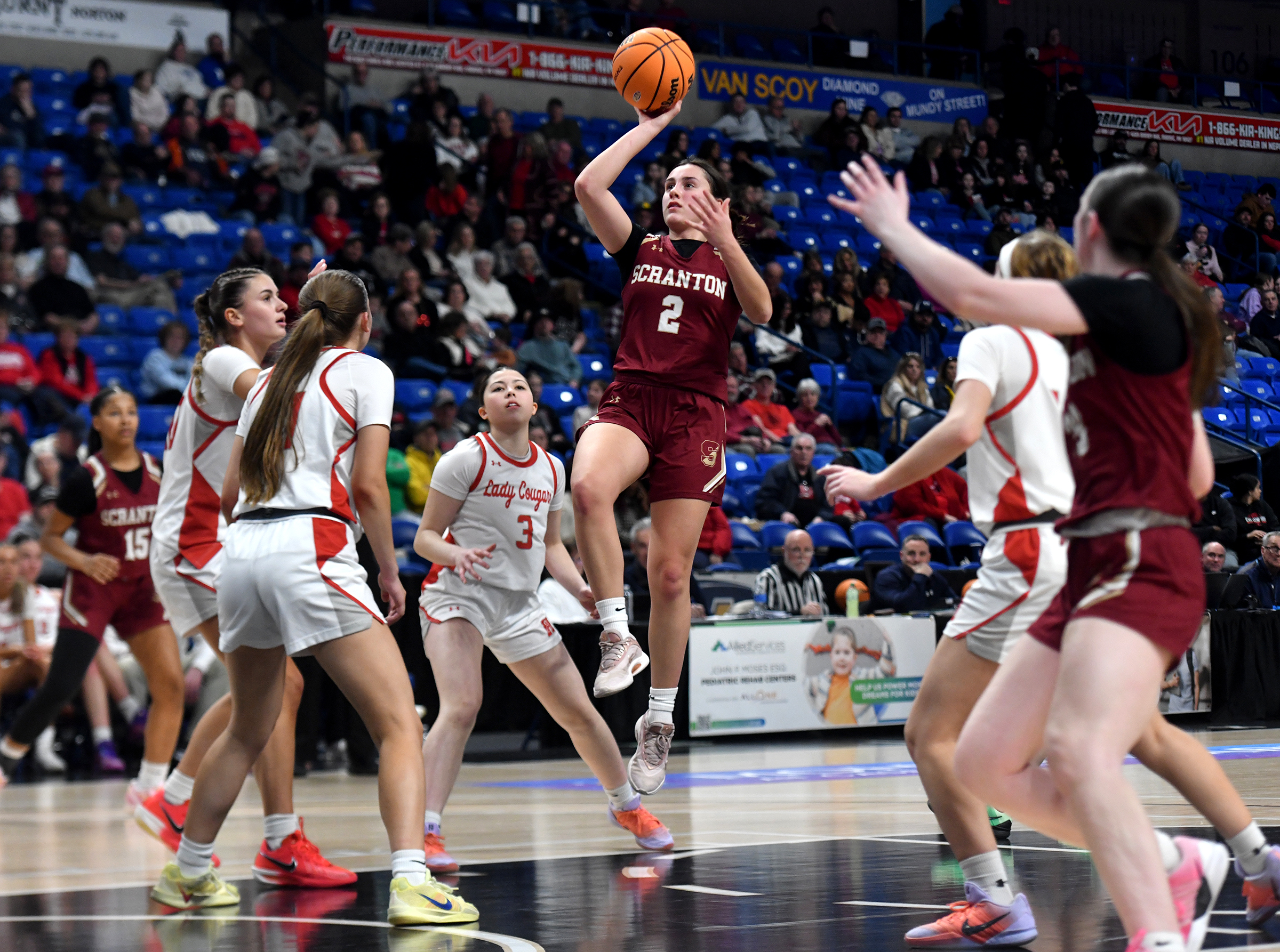 Scranton’s Chrissy Jacklinski (2) shoots over the Hazleton Area defense...