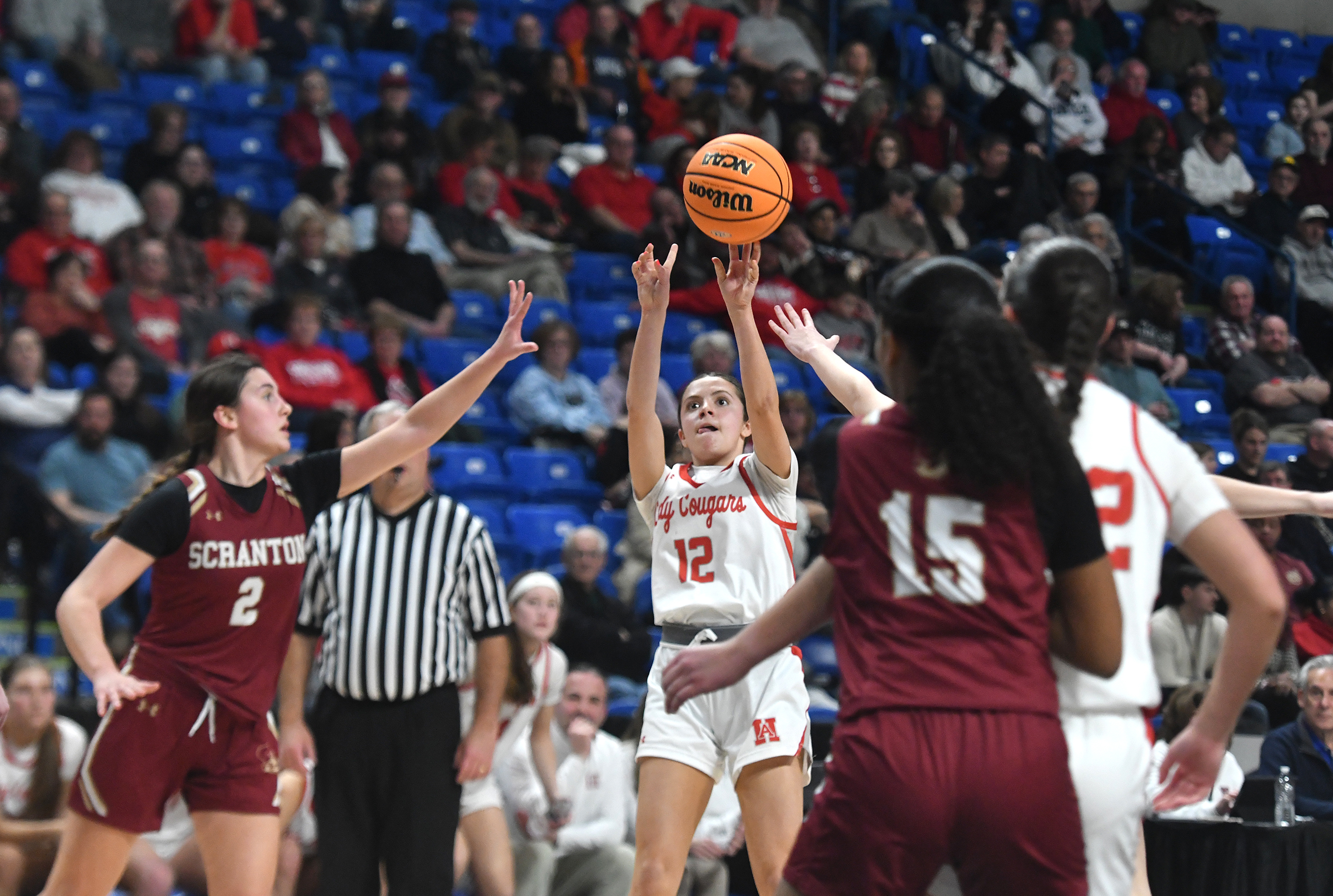 Hazleton Area’s Sofia Rodgers (12) shoots a three-pointer during the...