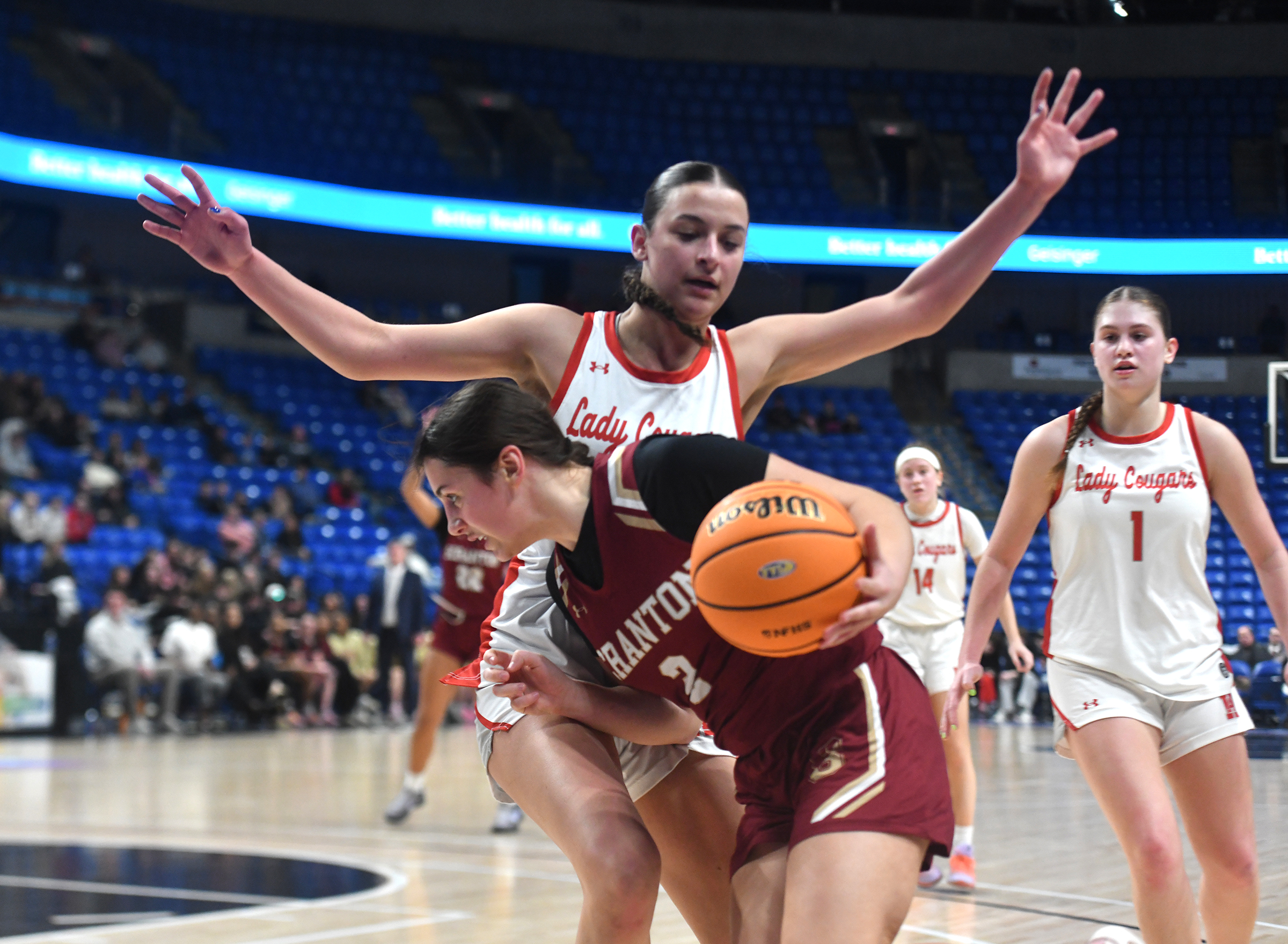 Scranton’s Chrissy Jacklinski (2) drives the ball past the defense...