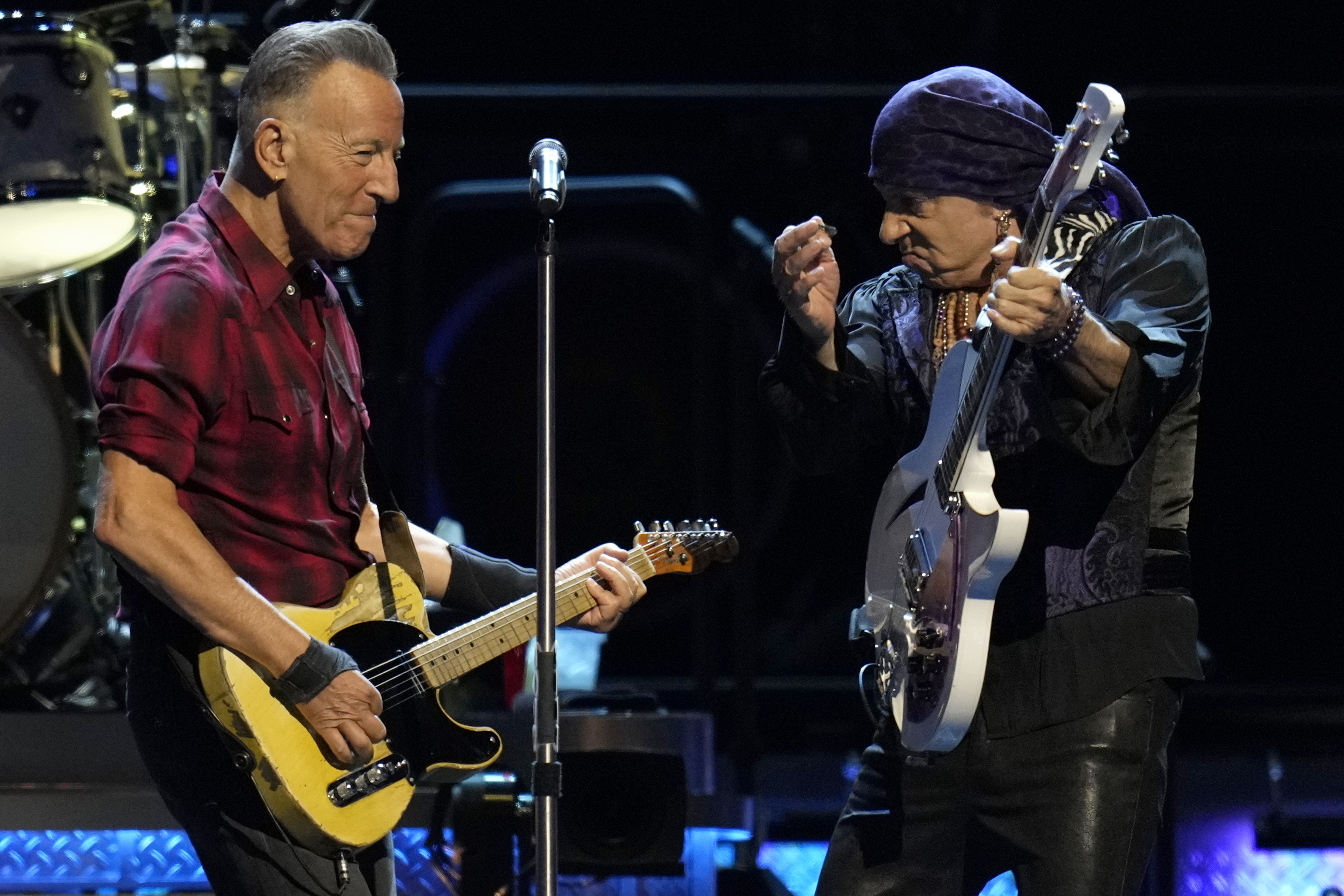 Bruce Springsteen, left, and Stevie Van Zandt, right, perform on Tuesday, March 19, 2024, in Phoenix.