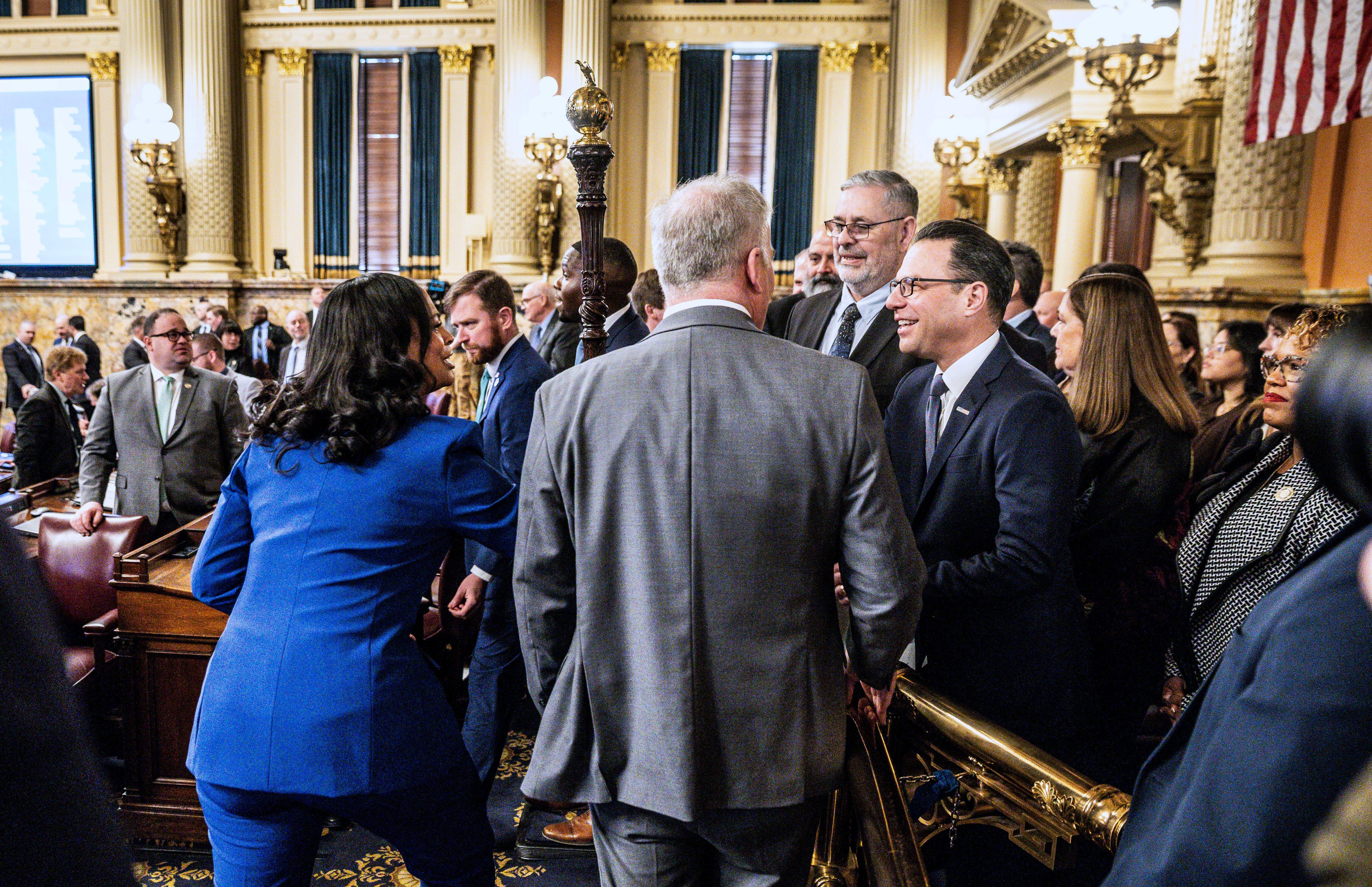 Gov. Josh Shapiro greets lawmakers prior to delivering his 2026-27...