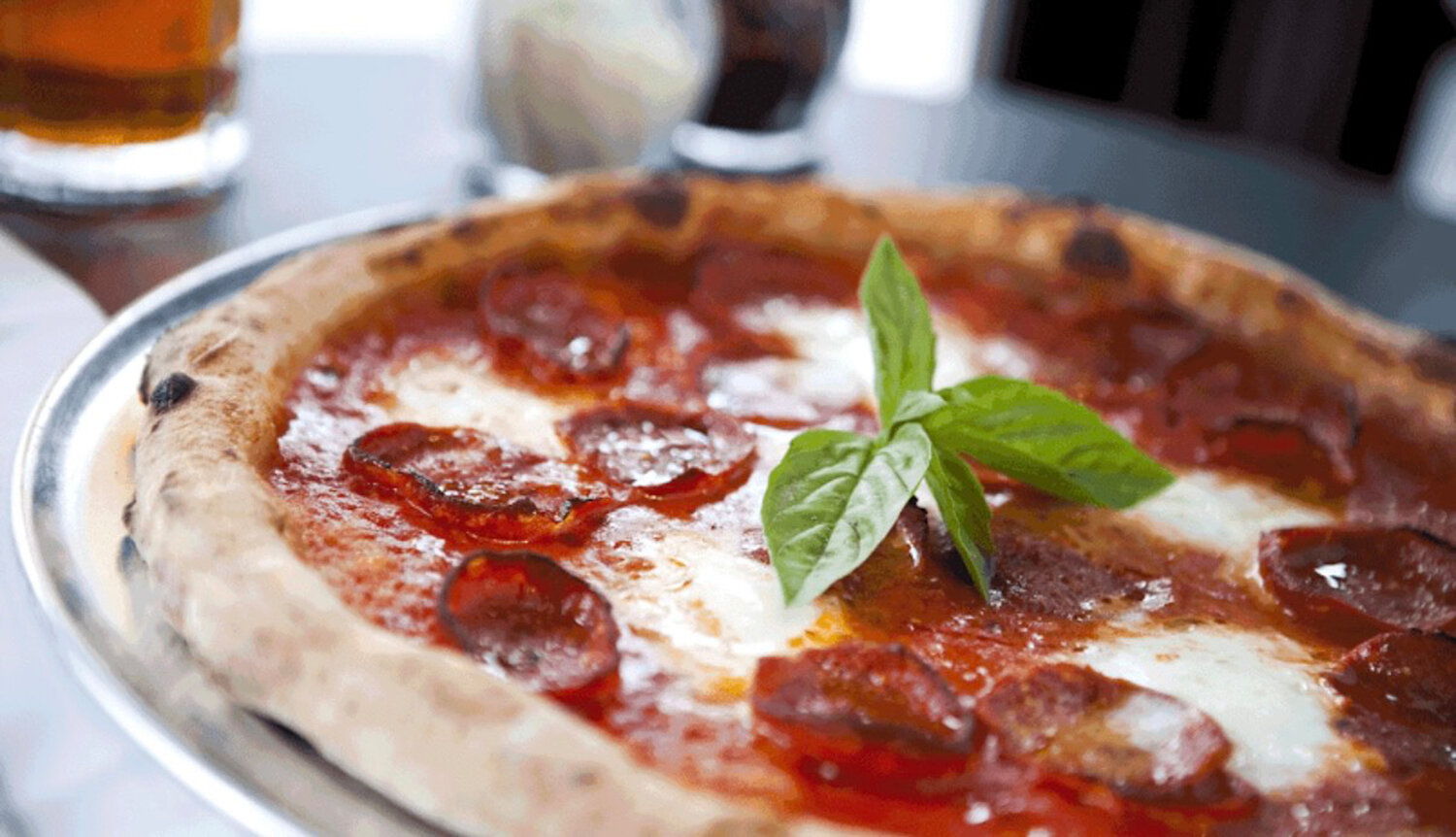 At Old City&rsquo;s Revolution House, artisanal pizzas are fired in a signature wood-fired oven.