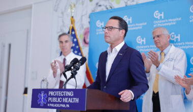 In this file photo, Gov. Josh Shapiro signs an executive order at Children