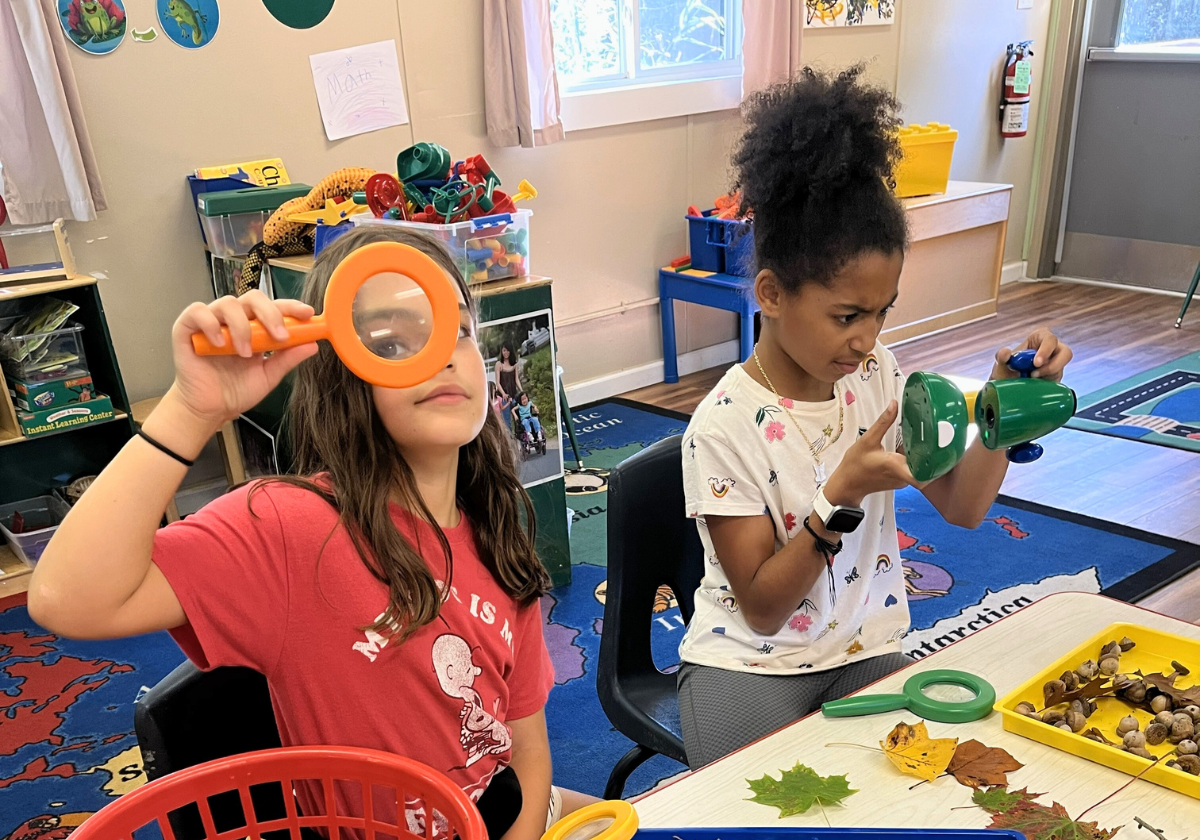 School-age children exploring activities at YMCA childcare program