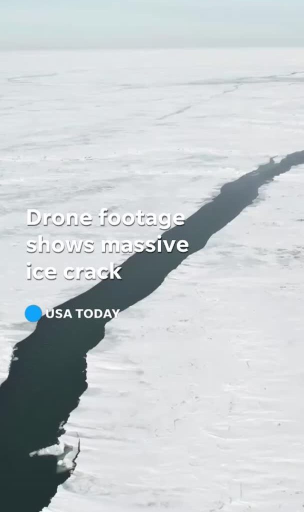Drone video shows an ice crack splitting across Lake Erie, it's approximately 80 miles long and is stretched from Ontario to near Cleveland, according to NOAA. - facebook.com