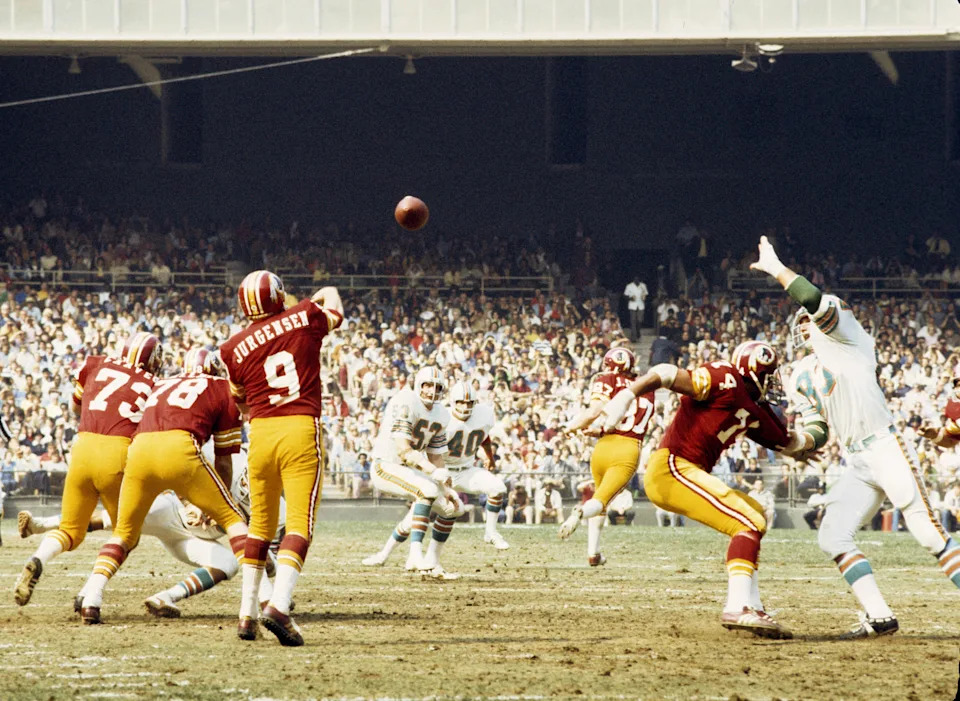 Hall of Fame quarterback Sonny Jurgensen (9) of the Washington Redskins throws a pass during the Redskins 20-17 victory over the Miami Dolphins on October 13, 1974 at RFK Stadium in Washington, D.C. (Photo by Nate Fine/Getty Images)