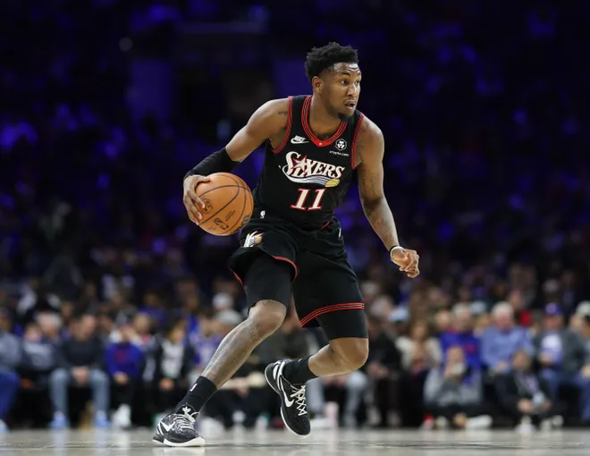Dec 4, 2025; Philadelphia, Pennsylvania, USA; Philadelphia 76ers forward Justin Edwards (11) in action against the Golden State Warriors during the second quarter at Xfinity Mobile Arena. Mandatory Credit: Bill Streicher-Imagn Images