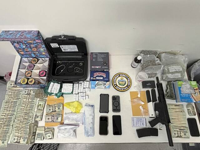 Police arrest 2; find large amounts of fentanyl, cocaine, crack, marijuana, $15k and a rifle in Penn Hills raid